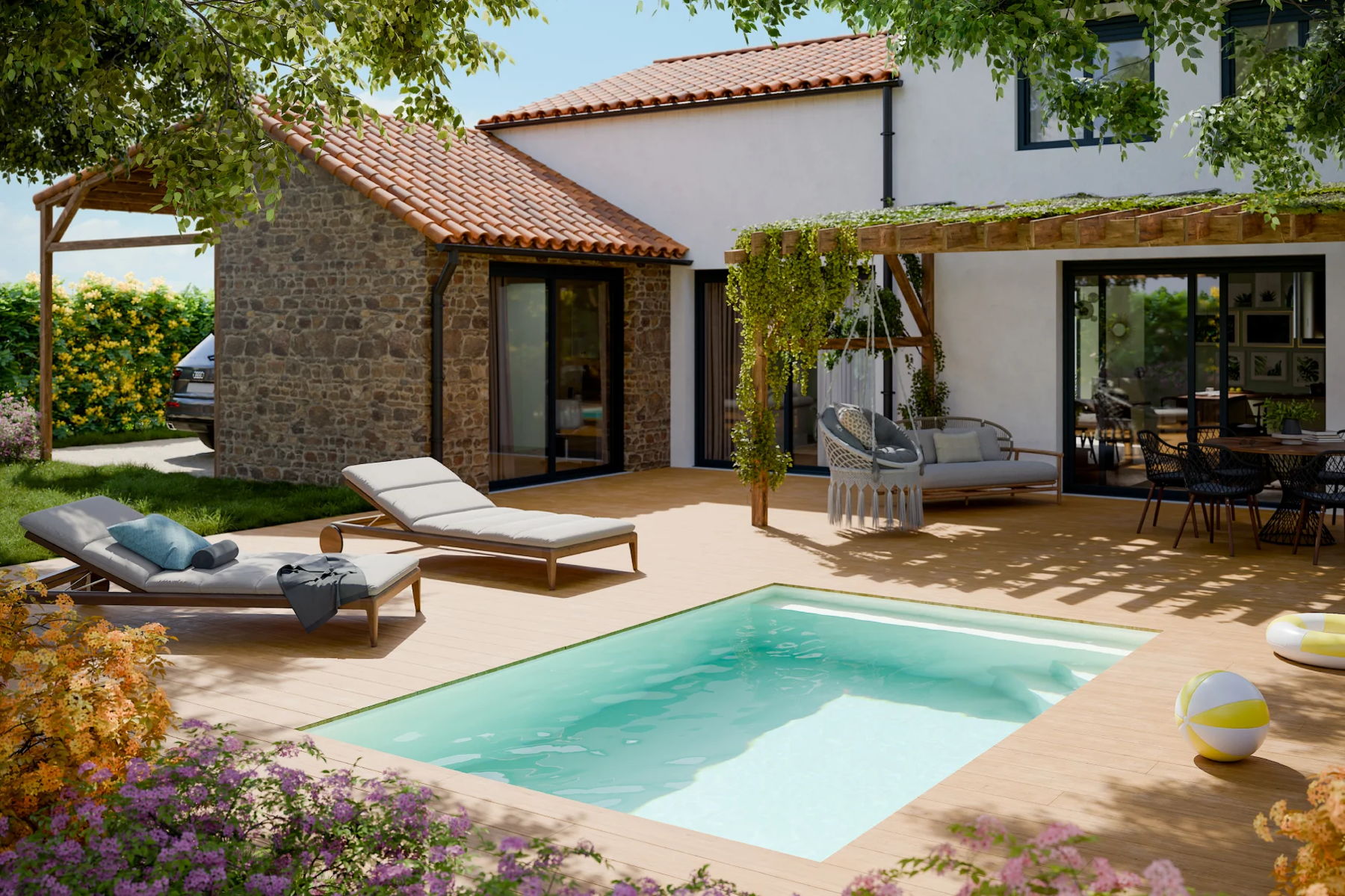 Piscine Quickly en kit aluminium installée dans un jardin, avec terrasse, transats et maison à l'arrière-plan